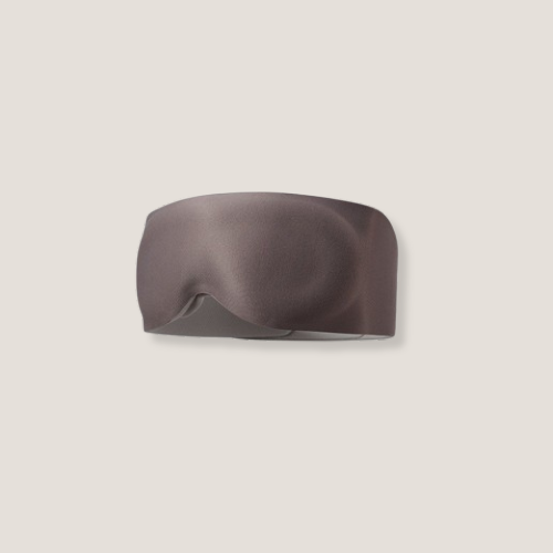 Weighted Eye Mask in Taupe featuring an ergonomic design for side sleepers and eye pressure relief