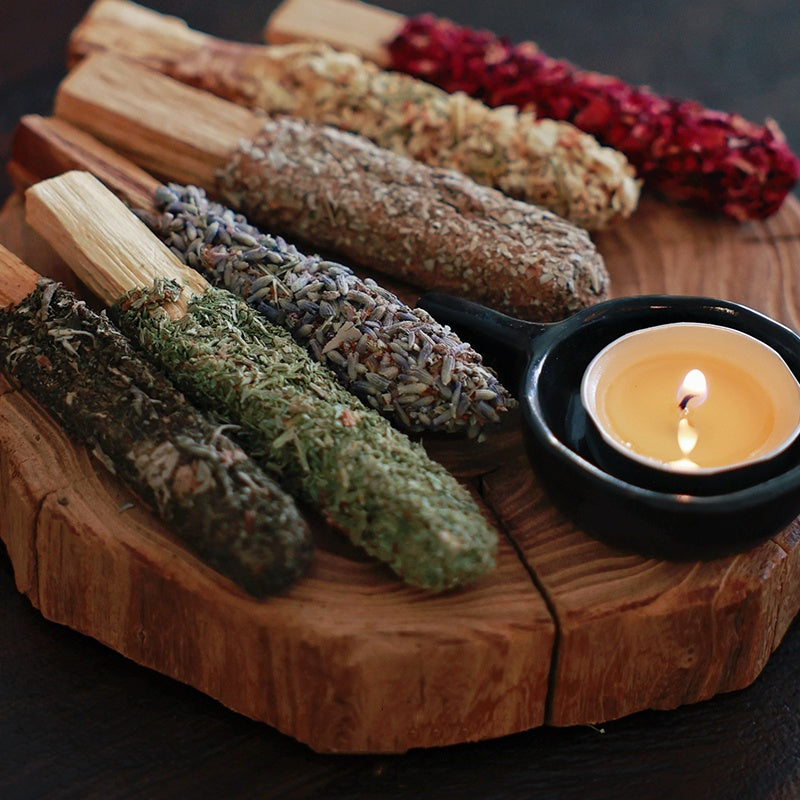 Close-up of customizable Floral Palo Santo sticks showing various dried botanicals for a unique sleep gift
